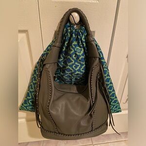 Oryany purse with storage pouch. Dark Gray Leather. Never used.